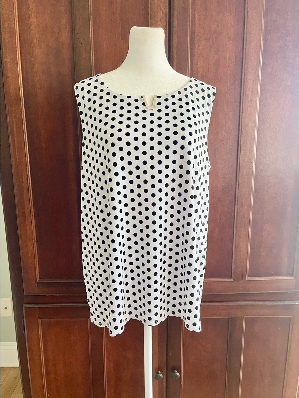 Calvin Klein Sleeveless Black and White Polka Dot Women's Top with Silver Logo